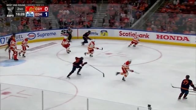 Leon Draisaitl backchecks, tracks, and forces dump in
