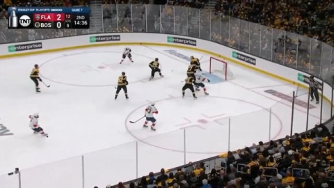 Swayman moves lateral to make save and stays square to rebound